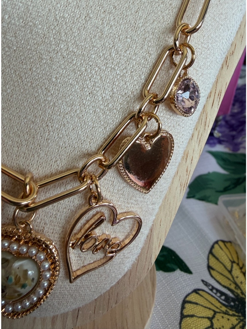 Boutique Gold-Tone Multi Heart Charm Necklace with Red Accents - Picture 2 of 6